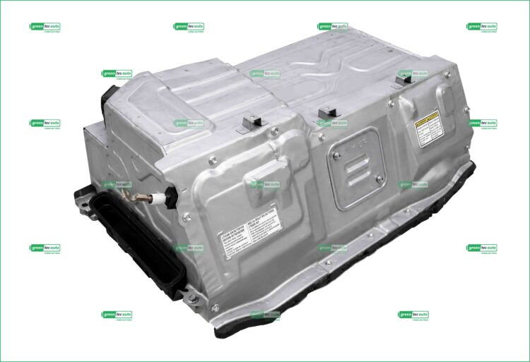 Large silver automotive battery pack with multiple modules and a warning label on the side.