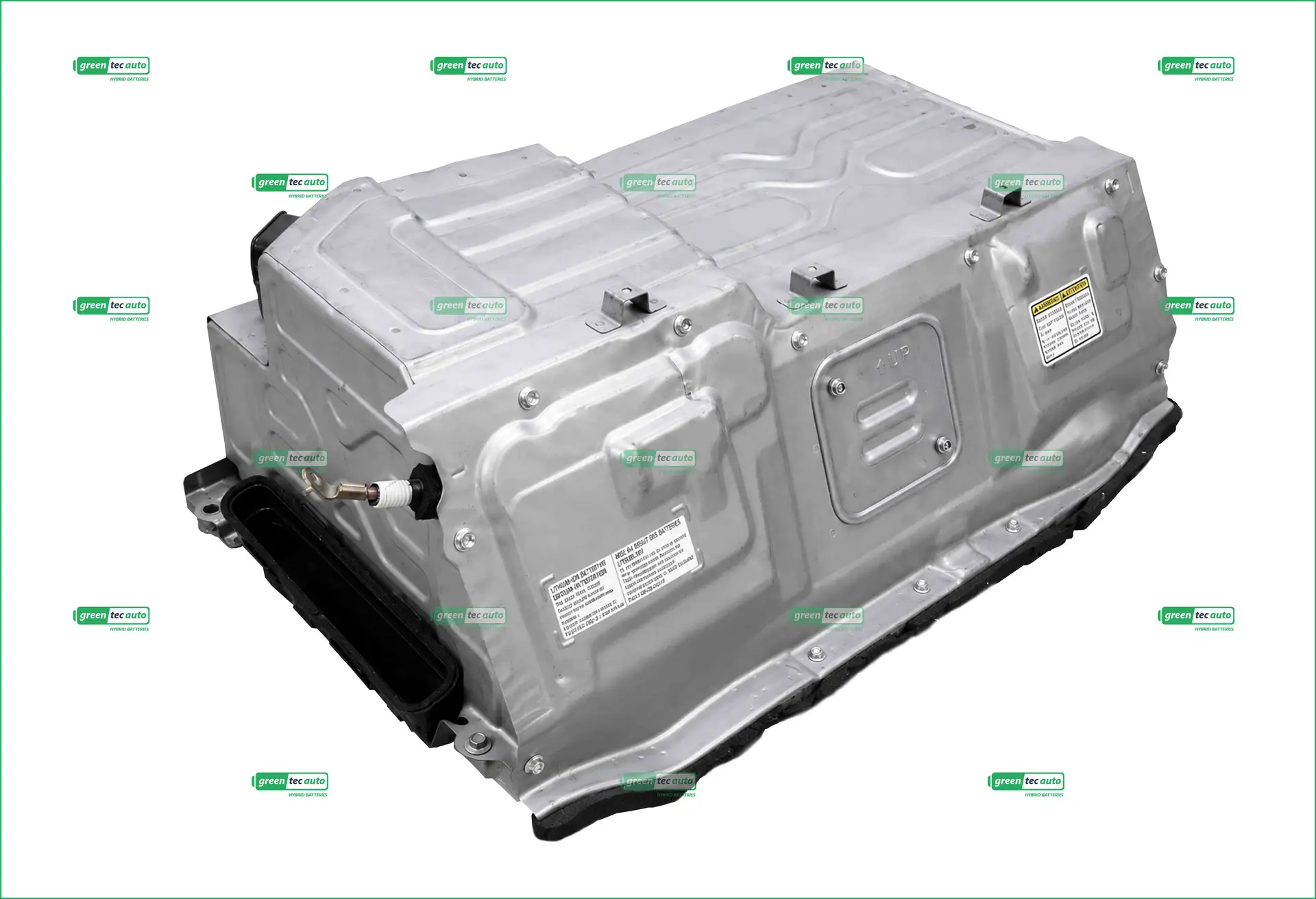 Large silver automotive battery pack with multiple modules and a warning label on the side.