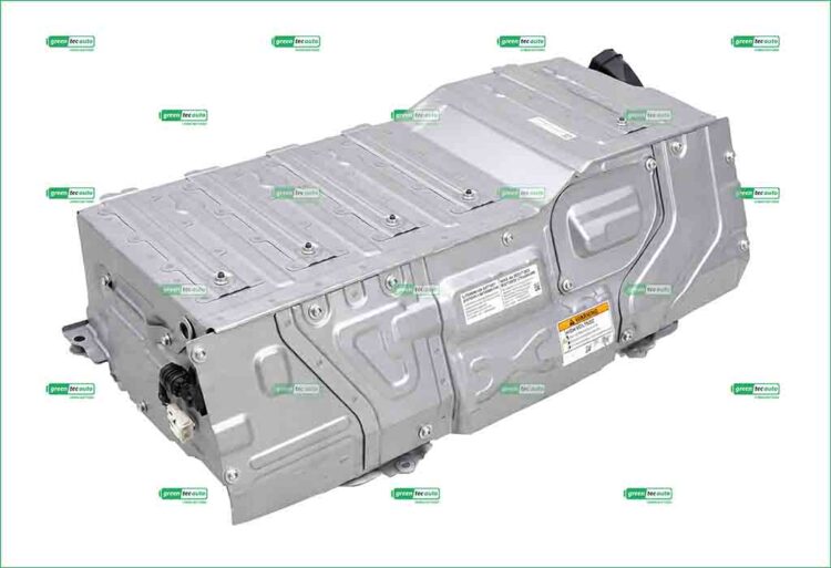 Metal EV battery pack module with cooling fins and warning label on its silver enclosure.