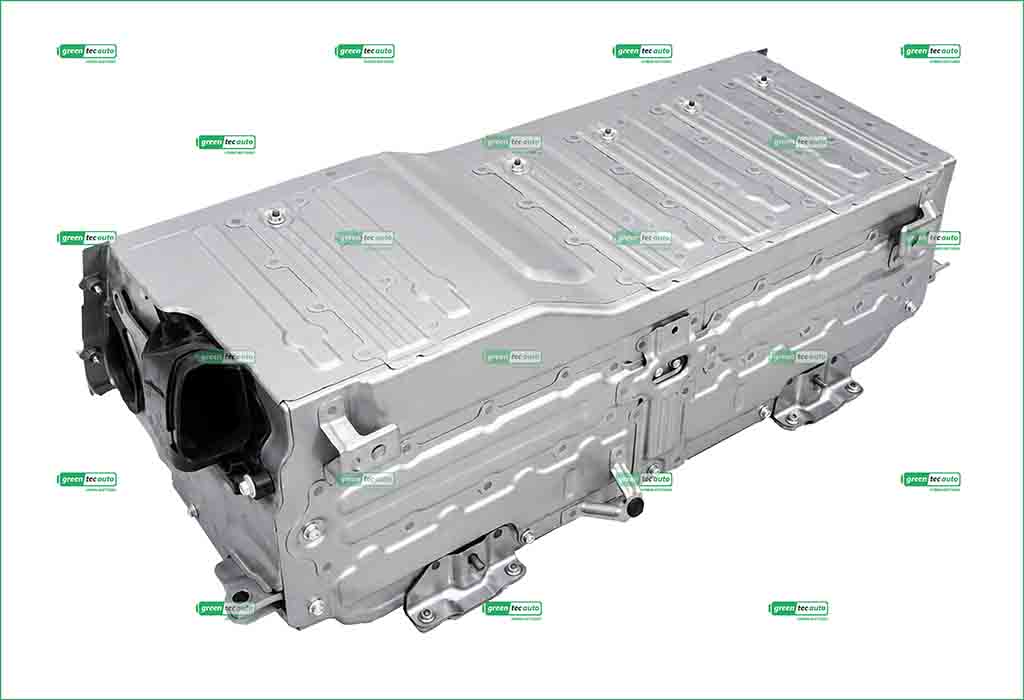Metal automotive powertrain housing with multiple mounting points and a large black connector opening on the left side.