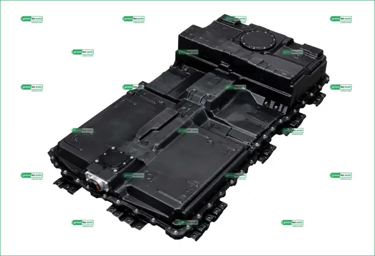 Large black automotive battery pack with modular sections and visible bolts, viewed at an angle