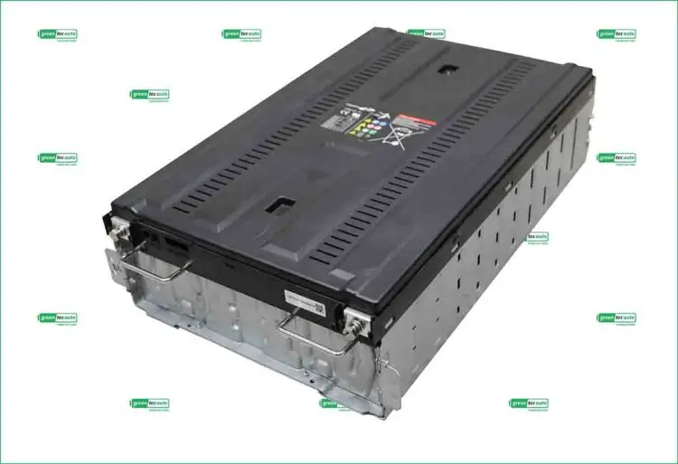 Large black automotive battery pack with vented top and metal side handles, shown at an angle.