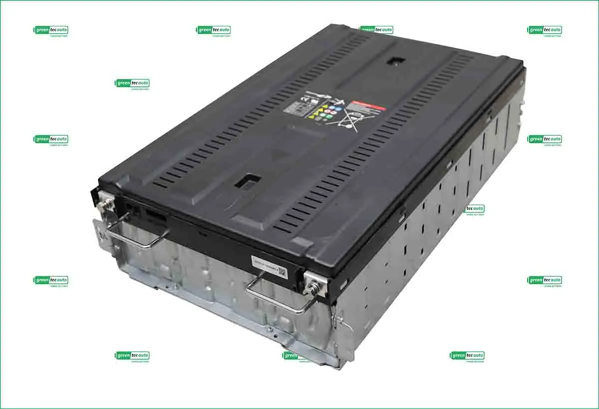 Large black automotive battery pack with vented top and metal side handles, shown at an angle.
