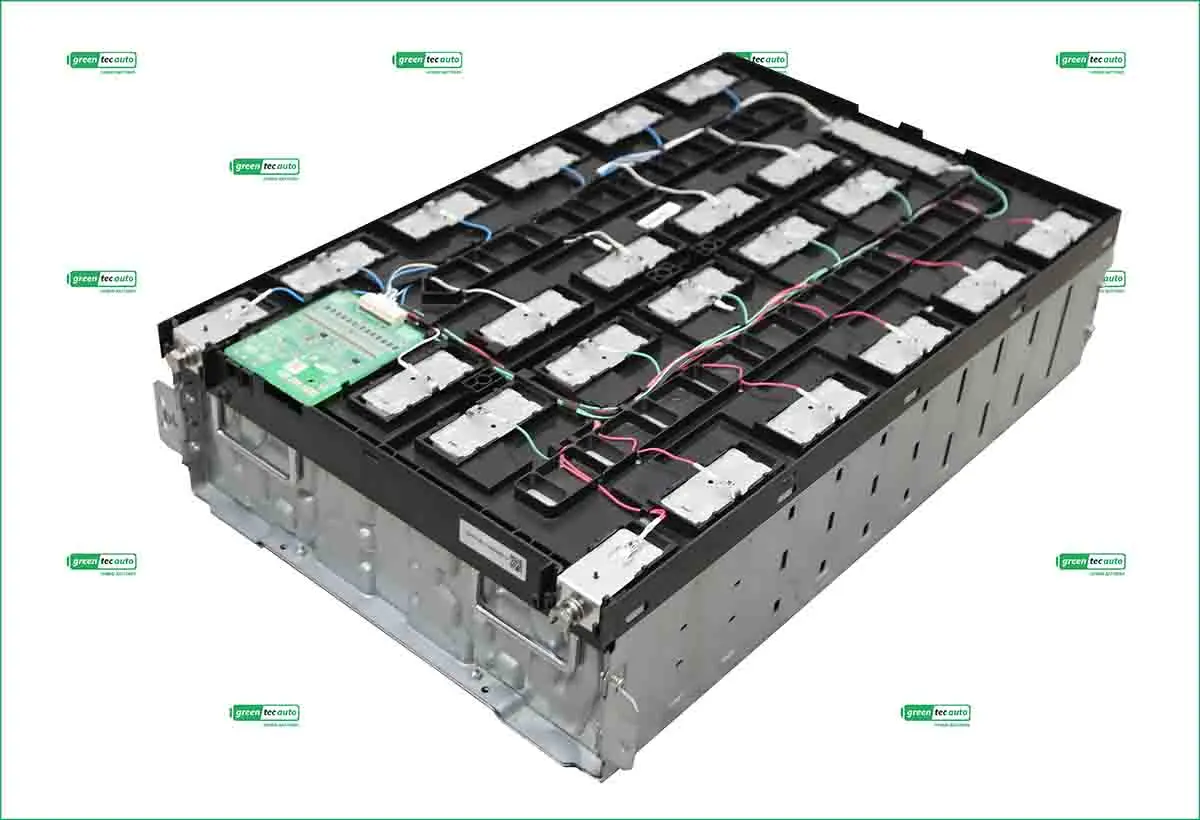 Large modular battery pack with stacked cell blocks and wiring harness, plus a green control PCB on the side.
