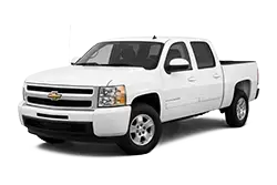 White Chevrolet pickup truck, three-quarter front view (white extended cab/crew cab).
