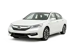 White sedan car shown on a white background, angled slightly from the front-left.