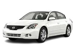 White four-door sedan viewed from the front-left, showing a mid-size car profile.