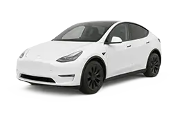 White electric sedan in a front three-quarter view on a white background