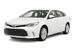 White Toyota Camry sedan shown from a front three-quarter angle against a white background.
